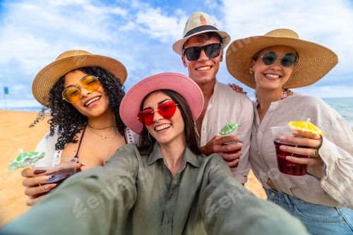 Preview: Group of diverse friends taking selfie at beach party