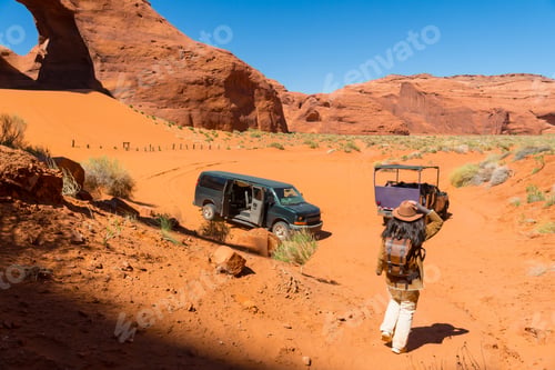 Preview: Woman hiking during navajo jeep tour monument valley