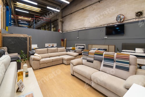 Preview: Furniture showroom displaying sofas, beds and interior design samples