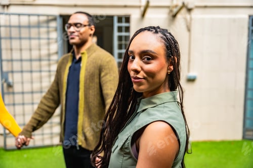 Preview: Diverse people holding hands in group therapy session