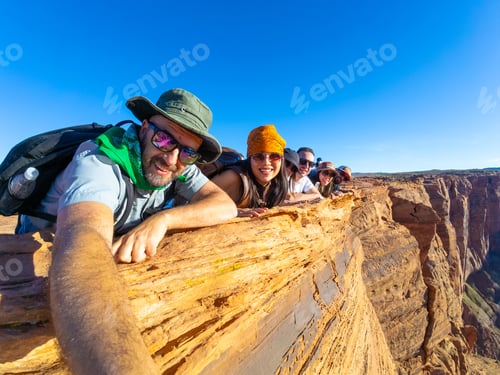 Preview: Group of friends exploring horseshoe bend canyon in arizona