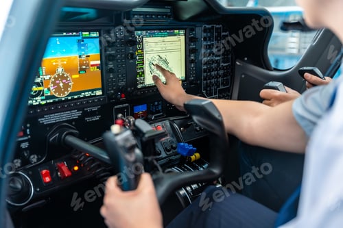 Preview: Pilots training in modern airplane cockpit controls