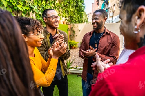 Preview: Diverse friends connecting outdoors in group therapy session