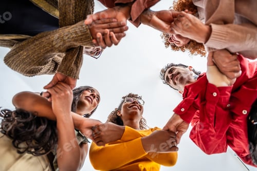 Preview: Diverse people joining hands forming strong support circle