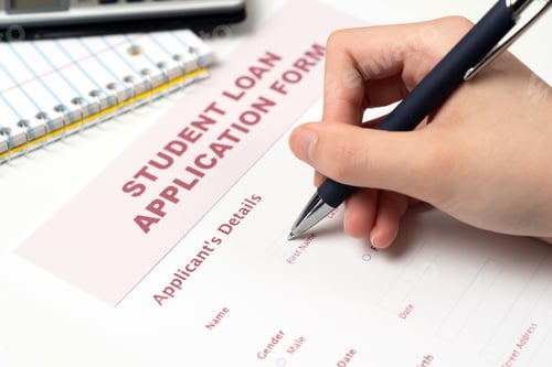 Preview: Student Loan Application Form on Laptop Keyboard