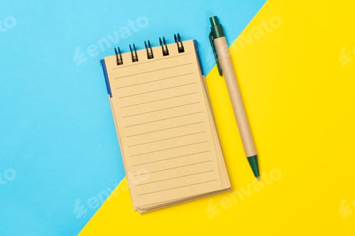 Preview: Minimalist Notepad and Pen on blue and yellow Background