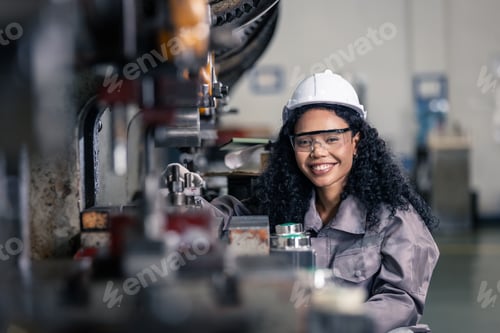 Preview: Smiling Female Manufacturing Engineer Operating Industrial Press Machine in Modern Factory
