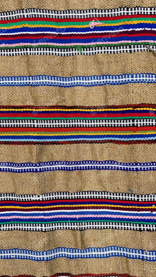 Preview: Homespun carpets made with colorful patterns woven on traditional looms in a local craft workshop du