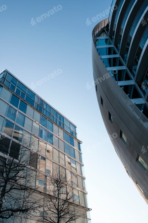 Preview: Modern architecture establishing city skyline against clear sky