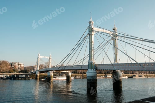 Preview: Albert bridge spanning river thames in london on a clear day