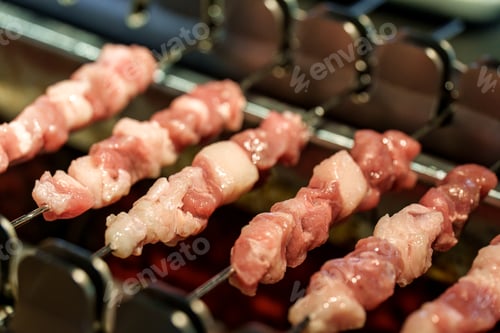 Preview: BBQ Skewers grilling on hot charcoal grill