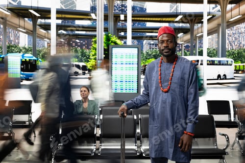 Preview: Portrait of african man in traditional robe near fast-moving pedestrians