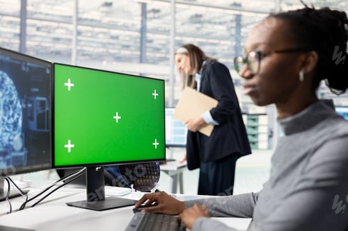 Preview: Green screen PC used by woman using artificial intelligence