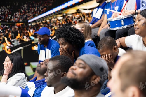 Preview: Disappointed soccer supporters reacting to missed chance during tense match