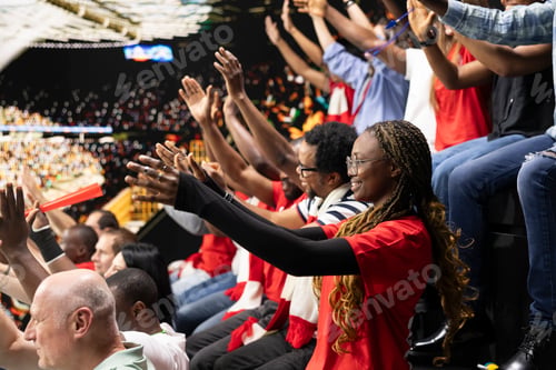Preview: Packed stadium with cheering supporters during thrilling soccer match