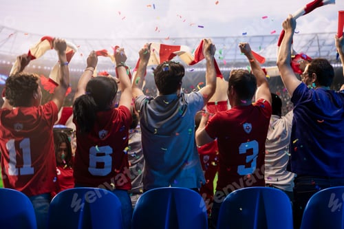 Preview: Confetti falling over soccer fans during match win celebration