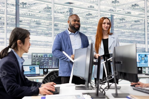 Professionals Collaborating in a Modern High-Tech Office Environment
