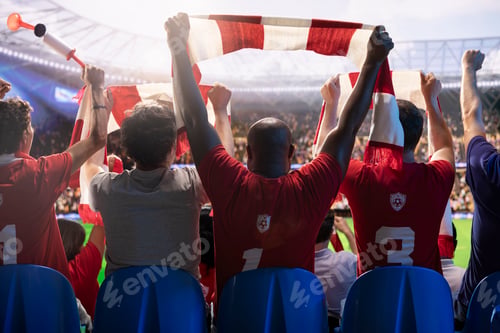 Preview: Rear view of soccer supporters raising red scarves