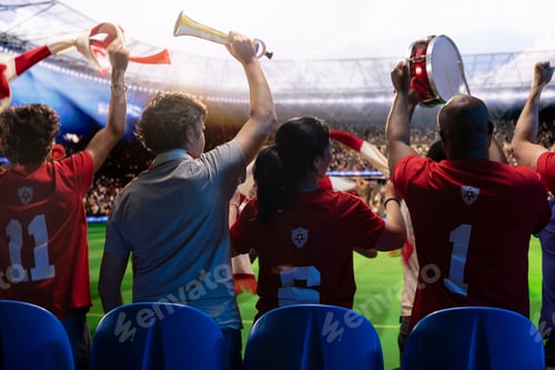 Preview: Rear view of football supporters in red team jerseys