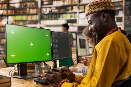 Preview: Green screen desktop monitor mockup with student using keyboard
