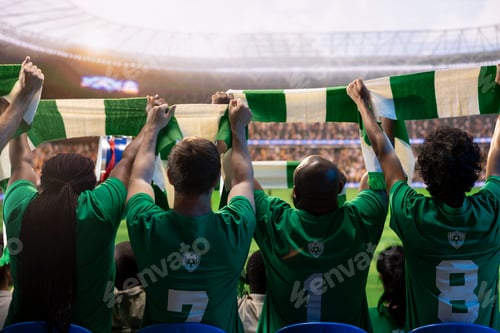 Preview: Football supporters lifting scarves across packed stadium