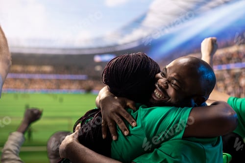 Preview: Close up of smiling soccer fans celebrating match win, hugging