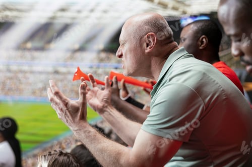 Preview: Side view of frustrated male football supporter gesturing with open hands