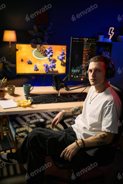 Preview: Portrait of Adult Man Streaming Gameplay in Home Studio Setup
