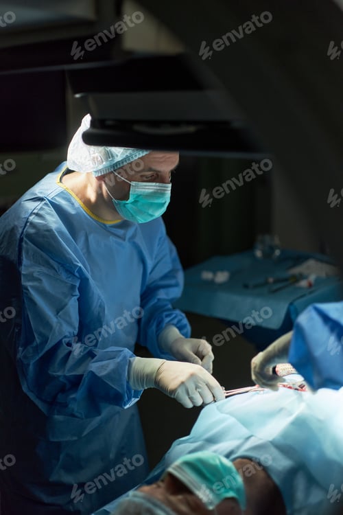 Preview: Adult Man Surgeon Conducting Sterile Procedure for Hospital Care