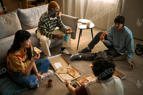 Preview: Diverse Teenagers Sharing Pizza during Inclusive Social Gathering
