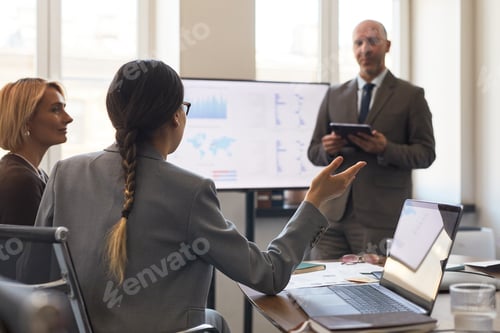 Preview: Business Team Discussing Data during Corporate Strategy Meeting