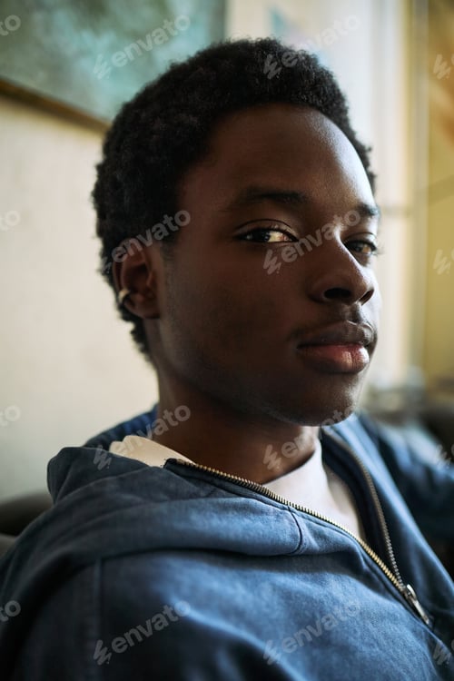 Preview: Portrait of Black Teenager Boy Posing for Identity Campaign
