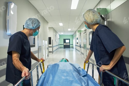 Preview: Medical Team Transporting Patient through Hospital for Emergency Care