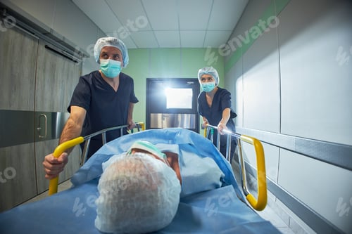 Preview: Hospital Staff Rushing Senior Patient Toward Surgery for Emergency Care