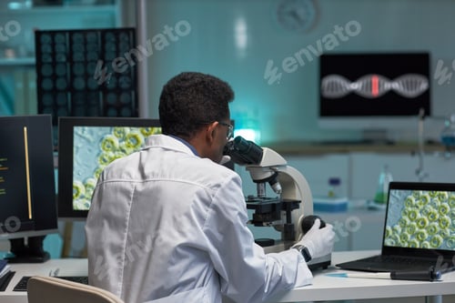 Preview: Black Man Researcher Analyzing Samples for Medical Innovation