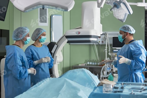 Preview: Medical Team Preparing Patient for Surgery in Operating Room