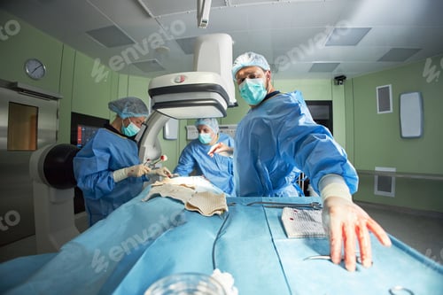 Preview: Team of Surgeons Performing Operation in Hospital Operating Room