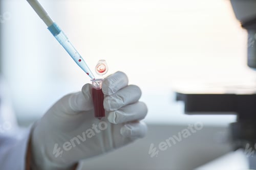Preview: Scientist Handling Blood Sample for Laboratory Testing Research