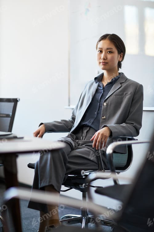 Preview: Portrait of Asian Adult Woman Sitting in Office for Leadership