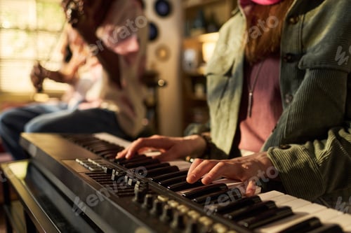 Preview: Young Woman Playing Keyboard during Home Music Rehearsal Session