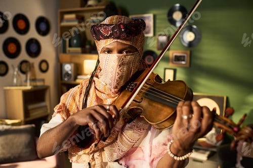 Preview: Portrait of Black Man Playing Violin for Cultural Music Performance