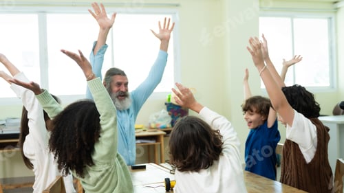 Preview: Teacher and students celebrating learning success together