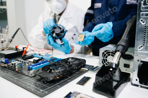 Preview: Technicians repairing computer hardware, testing components and upgrading PC systems. Technology ser