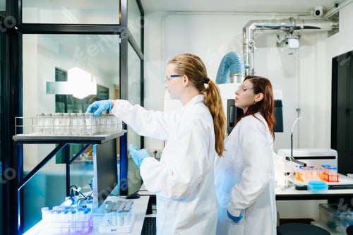 Preview: Scientists Collaborating in Modern Laboratory Biotechnology Research, Teamwork & Medical Innovation