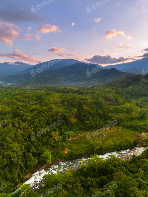 Preview: Beautiful morning view in Indonesia, panoramic landscape of rice fields with mountain ranges and cle