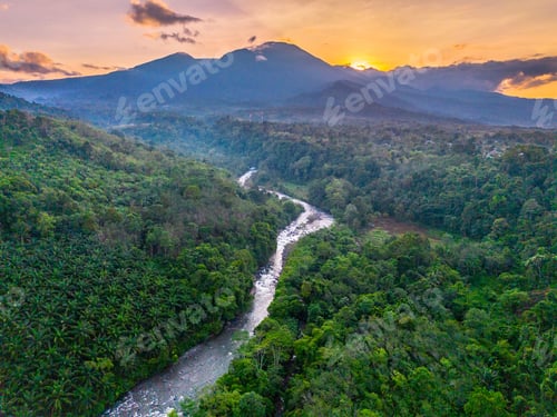 Preview: Beautiful morning view in Indonesia, panoramic landscape of rice fields with mountain ranges and cle