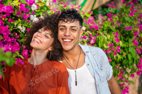 Preview: A multicultural couple enjoys a moment of love and connection in a beautiful blooming summer garden