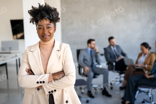 Preview: Multicultural professional businesspeople working together on research plan in boardroom.
