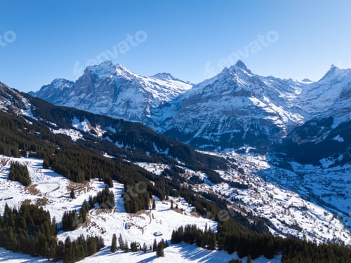 Preview: Wetterhorn and Schreckhorn Mountains in Winter. Switzerland. Aerial View