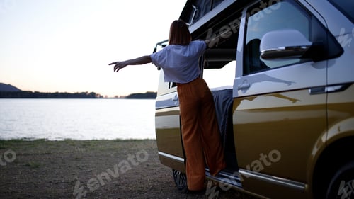 Preview: Woman enjoying freedom on a van life road trip